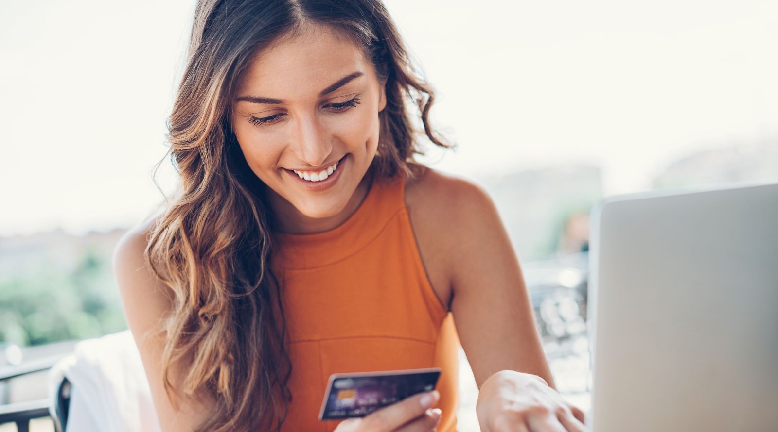 girl with credit card in hand